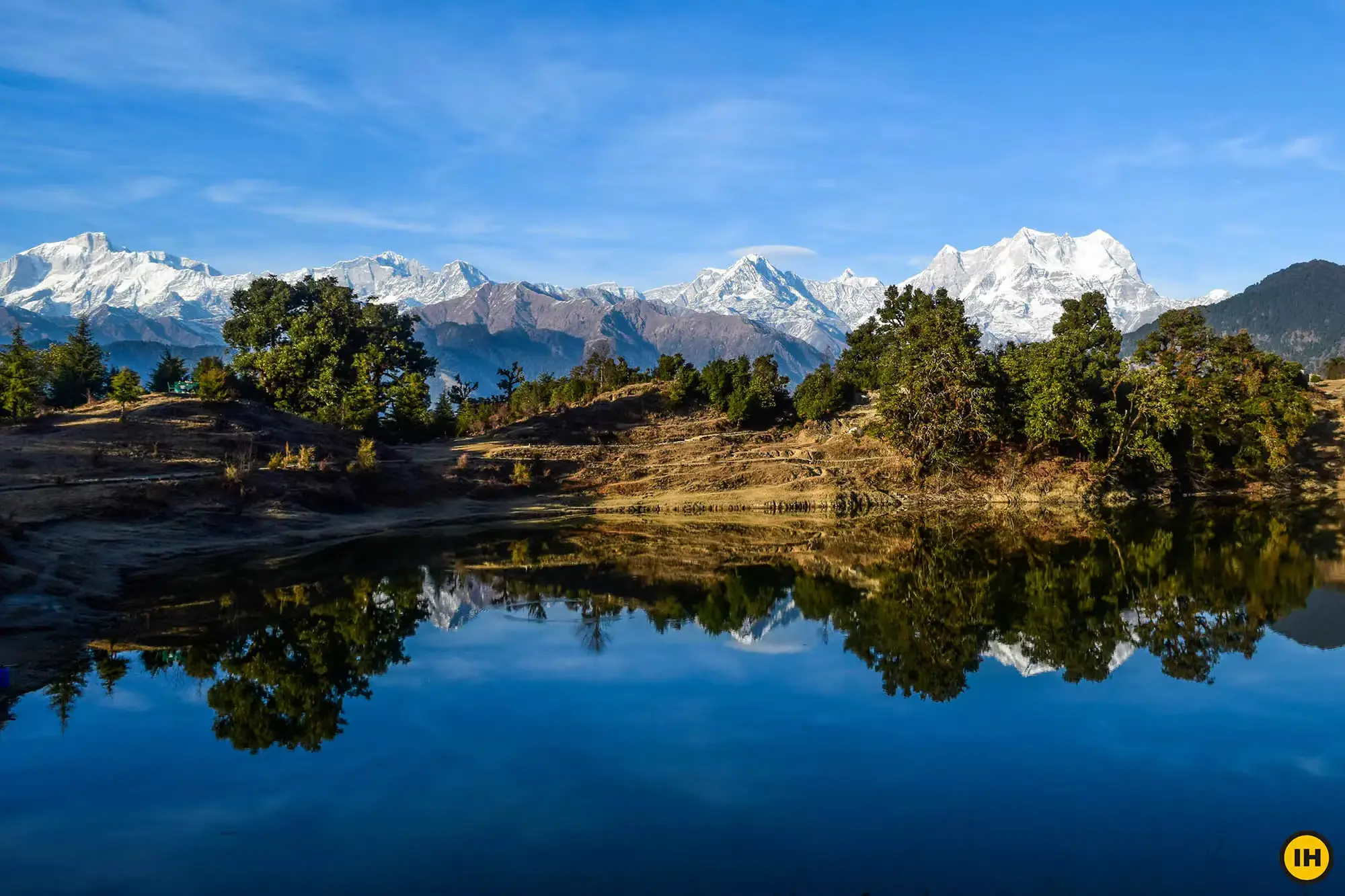 Deoria Tal lake reflecting Chaukhamba peaks