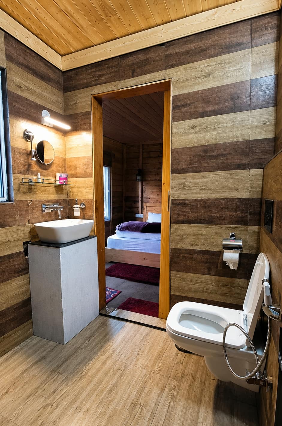 Rustic wooden bathroom with modern sink and toilet