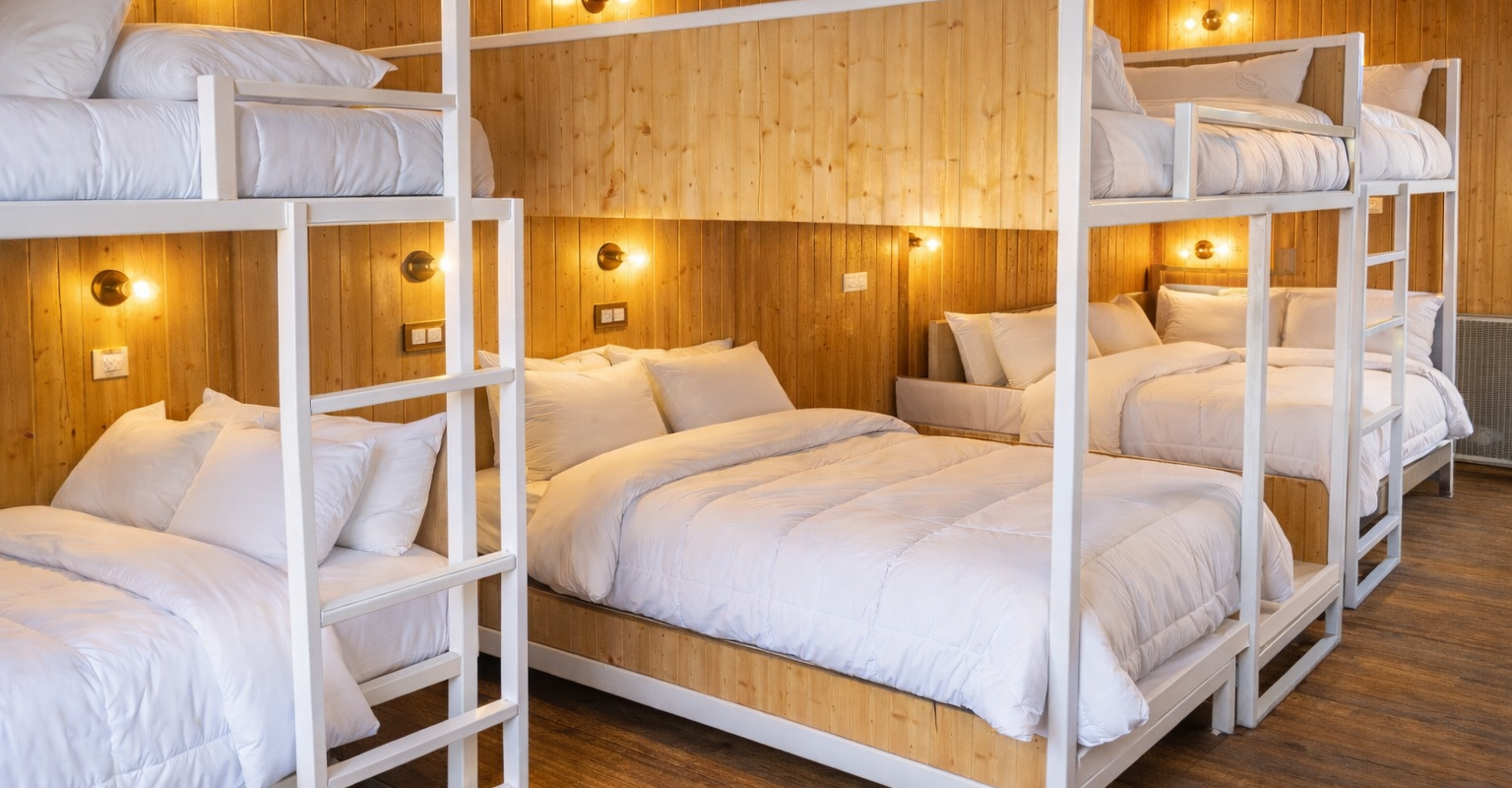 Clean and modern Executive Room bathroom at Chopta Resort in Chopta Uttarakhand with shower area and 24/7 hot water.